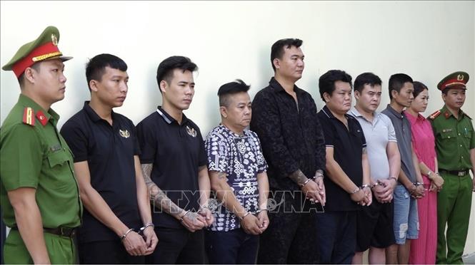 Các đối tượng tại cơ quan công an. Ảnh: TTXVN phát