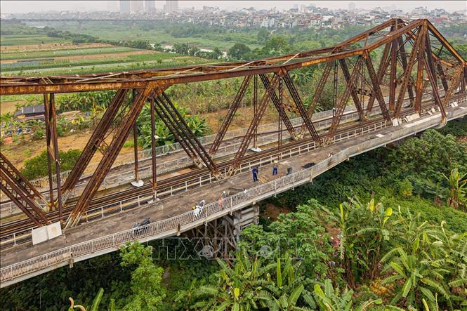 Không khí thi công diễn ra khẩn trương, tập trung. Ảnh: Phạm Tuấn Anh - TTXVN
