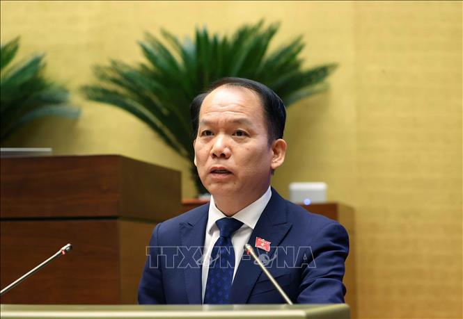 Bộ trưởng Bộ Tư pháp Hoàng Thanh Tùng phát biểu giải trình, làm rõ một số vấn đề đại biểu Quốc hội nêu. Ảnh: Văn Điệp –TTXVN