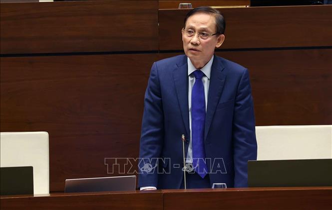Bộ trưởng Bộ Ngoại giao Lê Hoài Trung phát biểu giải trình, làm rõ một số vấn đề đại biểu Quốc hội nêu. Ảnh: Văn Điệp –TTXVN