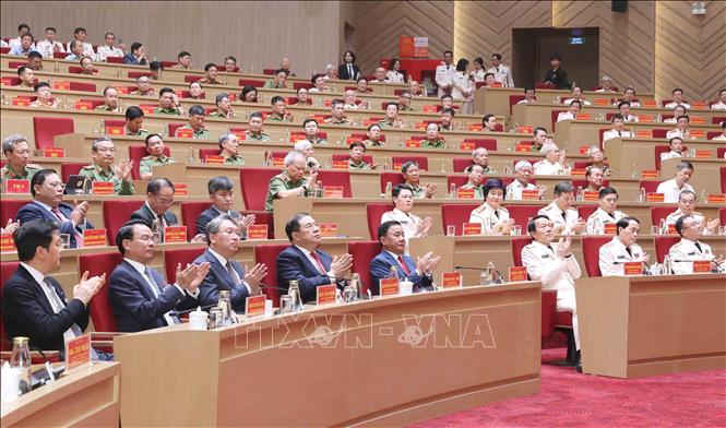 The delegates attend the event. VNA Photo