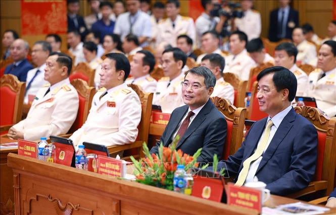 Thủ tướng Lê Minh Hưng và các đại biểu dự Lễ kỷ niệm 80 năm Ngày truyền thống lực lượng Cảnh sát Quản lý hành chính về trật tự xã hội. Ảnh: Dương Giang-TTXVN 
