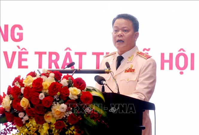Thiếu tướng Vũ Văn Tấn, Cục trưởng Cục Cảnh sát Quản lý hành chính về trật tự xã hội phát biểu. Ảnh: Phạm Kiên - TTXVN