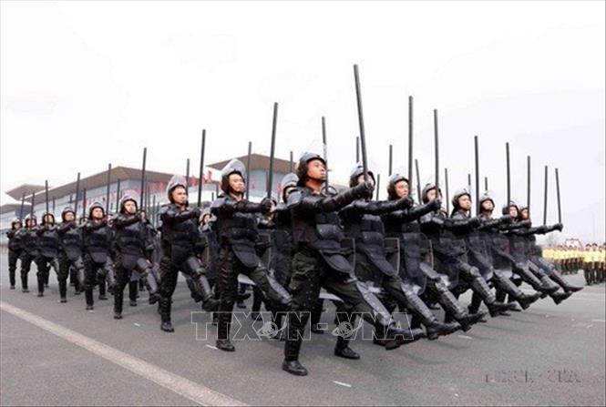 Khối lực lượng cảnh sát cơ động tham gia diễu binh trong Lễ kỷ niệm 50 năm Ngày truyền thống lực lượng Cảnh sát cơ động (15/4/1974 - 15/4/2024) và đón nhận Danh hiệu Anh hùng Lực lượng vũ trang nhân dân lần thứ hai. Ảnh: Phạm Kiên - TTXVN
