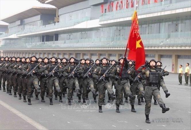 Khối lực lượng cảnh sát cơ động tham gia diễu binh trong Lễ kỷ niệm 50 năm Ngày truyền thống lực lượng Cảnh sát cơ động (15/4/1974 - 15/4/2024) và đón nhận Danh hiệu Anh hùng Lực lượng vũ trang nhân dân lần thứ hai. Ảnh: Phạm Kiên - TTXVN