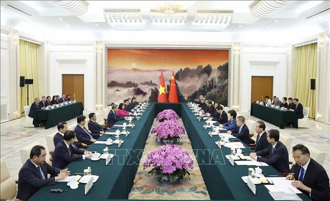 Tổng Bí thư, Chủ tịch nước Tô Lâm hội kiến Chủ tịch Chính hiệp toàn quốc Trung Quốc Vương Hộ Ninh. Ảnh: Thống Nhất - TTXVN