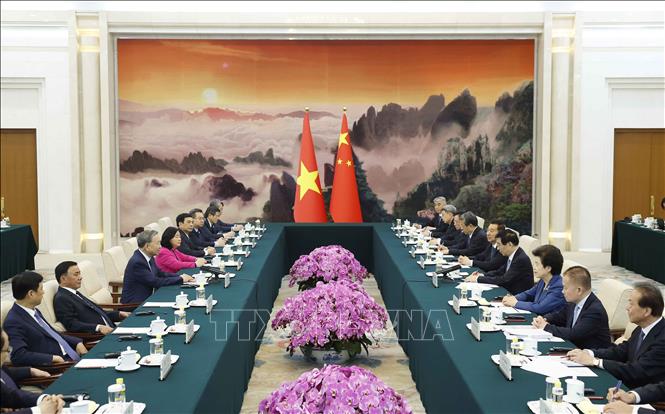 Tổng Bí thư, Chủ tịch nước Tô Lâm hội kiến Chủ tịch Chính hiệp toàn quốc Trung Quốc Vương Hộ Ninh. Ảnh: Thống Nhất - TTXVN