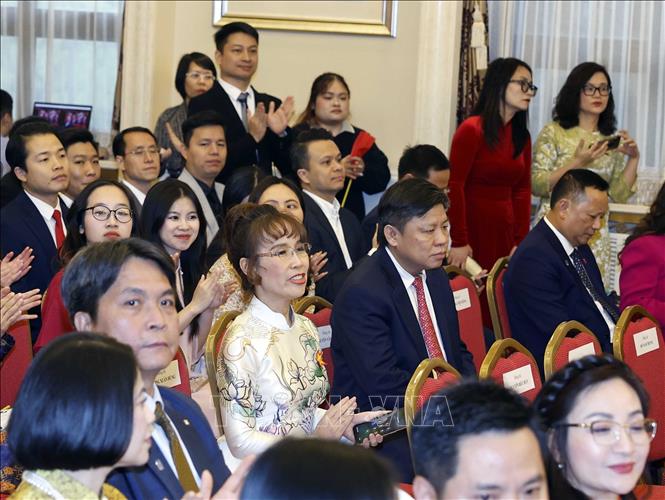 Cán bộ, nhân viên Đại sứ quán và đại diện cộng đồng người Việt Nam tại Trung Quốc tham dự buổi gặp gỡ Tổng Bí thư, Chủ tịch nước Tô Lâm. Ảnh: Thống Nhất - TTXVN