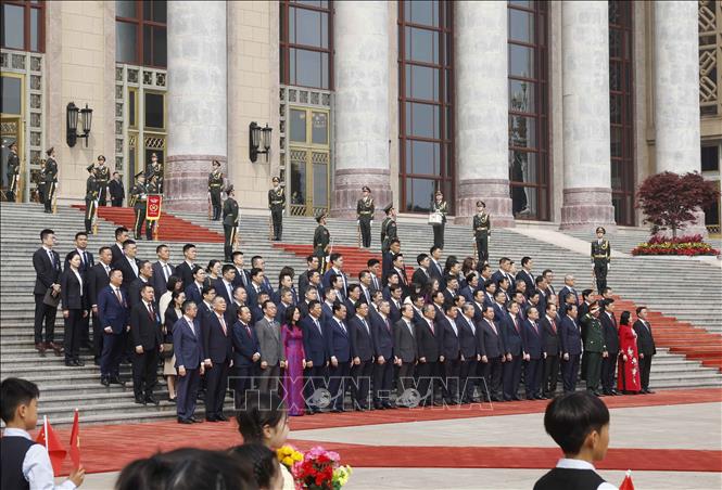 Đoàn đại biểu cấp cao Việt Nam tham dự Lễ đón. Ảnh: Thống Nhất – TTXVN