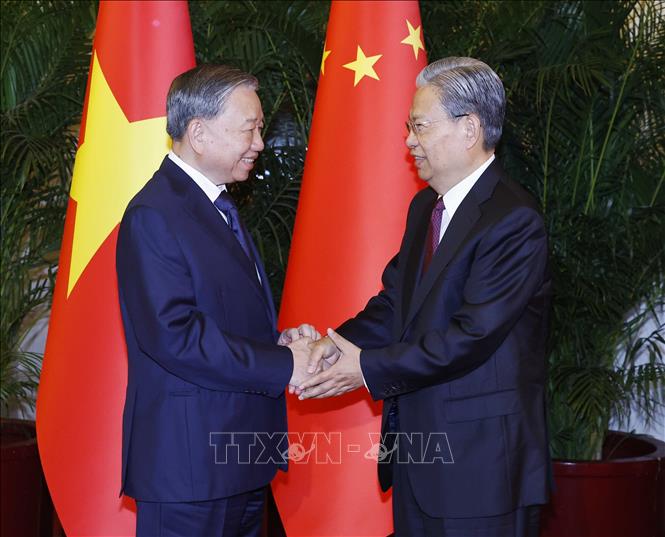 Tổng Bí thư, Chủ tịch nước Tô Lâm hội kiến Ủy viên trưởng Nhân đại toàn quốc Trung Quốc Triệu Lạc Tế. Ảnh: Thống Nhất - TTXVN