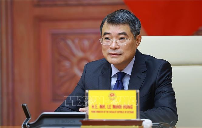 Thủ tướng Lê Minh Hưng tham dự Hội nghị Thượng đỉnh trực tuyến Cộng đồng phát thải ròng bằng 0 châu Á (AZEC) mở rộng. Ảnh: Dương Giang - TTXVN 
