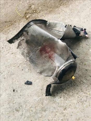 Bình khí (nghi là bình khí cười N2O) phát nổ. Ảnh: TTXVN phát 