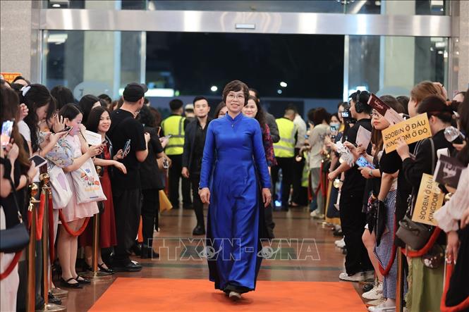 Bà Vũ Việt Trang, Tổng Giám đốc Thông tấn xã Việt Nam, Phó trưởng Ban Tuyên giáo và Dân vận Trung ương đến dự Lễ trao Giải thưởng Cống hiến 2026. Ảnh: Phạm Tuấn Anh - TTXVN