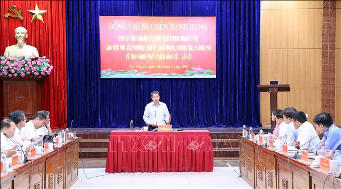 Quang cảnh buổi làm việc của Chủ tịch UBND thành phố Đà Nẵng Nguyễn Mạnh Hùng với các địa phương phía Nam thành phố. Ảnh: Trần Tĩnh - TTXVN