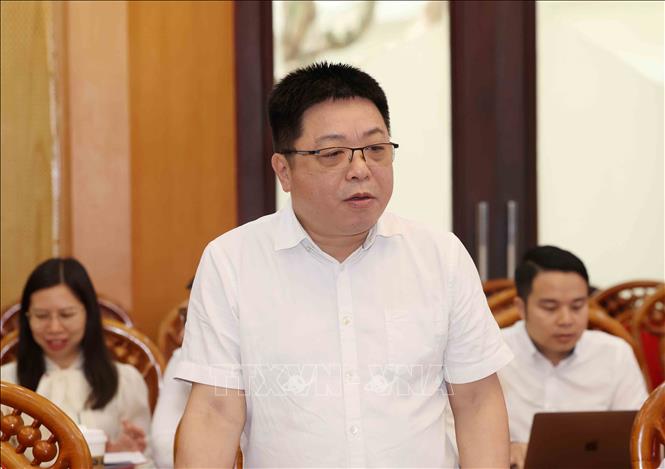 Đồng chí Quế Đình Nguyên, Phó Tổng Biên tập báo Nhân Dân phát biểu tại buổi làm việc. Ảnh: Phương Hoa - TTXVN