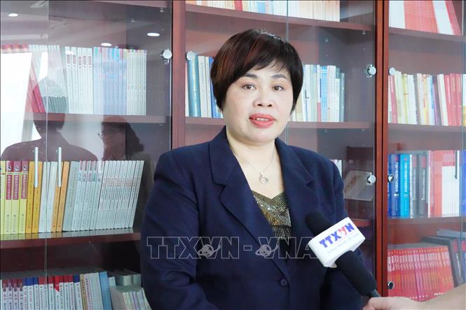 Giáo sư Phan Kim Nga trả lời phỏng vấn phóng viên TTXVN. Ảnh: Quang Hưng-PV TTXVN tại Trung Quốc