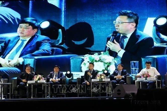 Ông Lê Quốc Minh, Phó Tổng giám đốc TTXVN trả lời phỏng vấn tại diễn đàn 