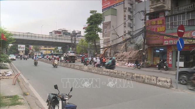 Đường Tam Trinh sau khi các hộ bàn giao mặt bằng. Ảnh: Quốc Lũy - TTXVN