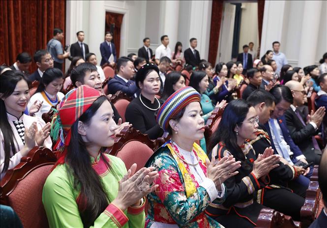 Các đại biểu tại buổi gặp mặt. Ảnh: Thống Nhất - TTXVN