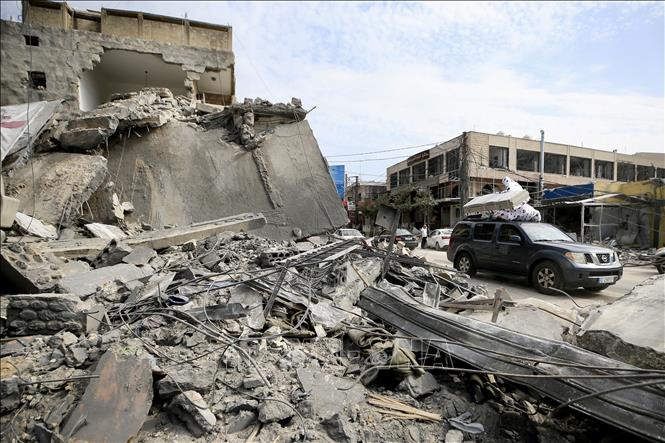 Cảnh đổ nát do xung đột tại Qasmiyeh, Liban. Ảnh: THX/TTXVN