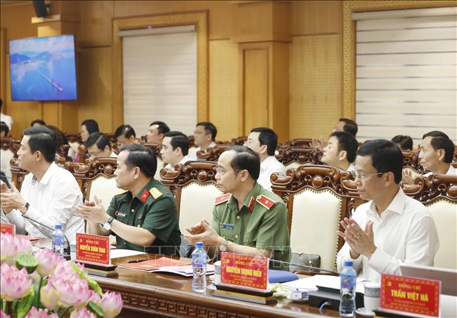 Các đại biểu tham dự buổi làm việc. Ảnh: Thống Nhất -TTXVN