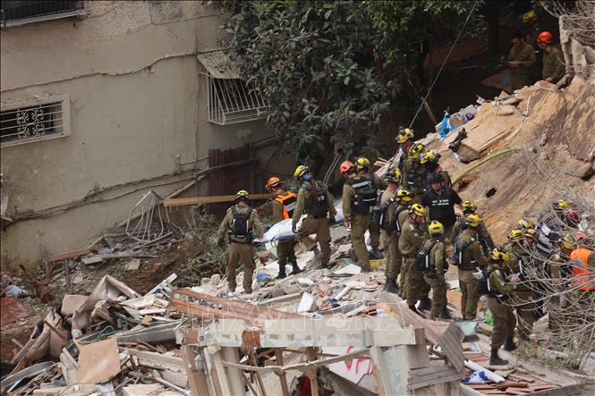 Một khu vực bị trúng tên lửa tại Haifa, Israel. Ảnh: THX/TTXVN