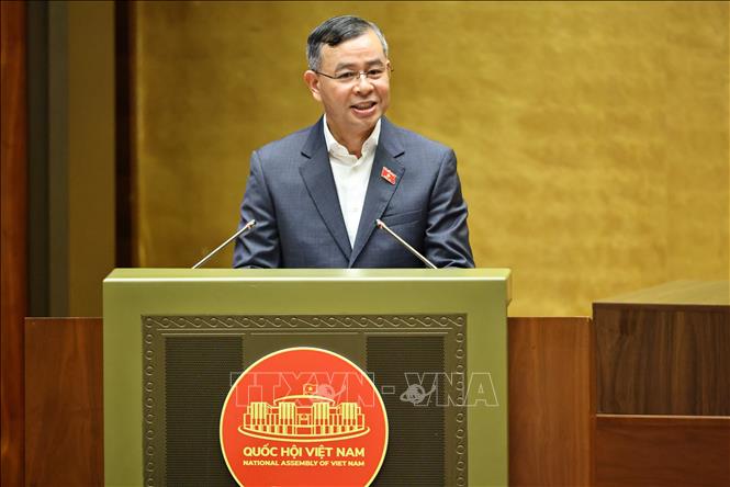 Bộ trưởng Bộ Tài chính Ngô Văn Tuấn giải trình, làm rõ một số vấn đề đại biểu Quốc hội nêu. Ảnh: Minh Đức - TTXVN