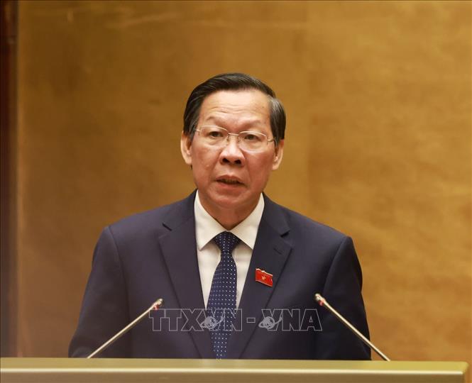 Ủy viên Ủy ban Thường vụ Quốc hội, Chủ nhiệm Ủy ban Kinh tế và Tài chính của Quốc hội Phan Văn Mãi trình bày dự thảo Nghị quyết về kế hoạch phát triển kinh tế - xã hội 05 năm giai đoạn 2026 - 2030. Ảnh: Tuấn Anh - TTXVN