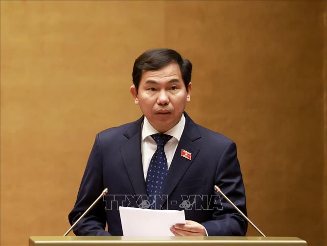 Ủy viên Ủy ban Thường vụ Quốc hội, Tổng Thư ký Quốc hội - Chủ nhiệm Văn phòng Quốc hội Lê Quang Mạnh trình bày dự thảo Nghị quyết Kỳ họp thứ Nhất, Quốc hội khoá XVI. Ảnh: Tuấn Anh - TTXVN