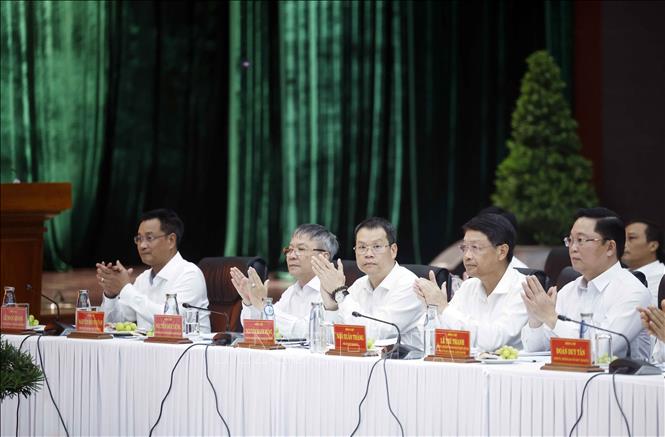 Các đồng chí trong Ban Thường vụ Thành ủy Đà Nẵng tham dự buổi làm việc. Ảnh: Thống Nhất - TTXVN