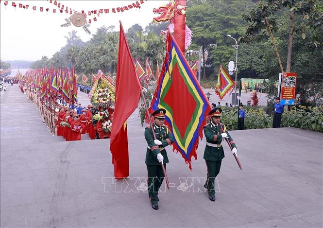 The ceremonial procession sets off toward Nghia Linh Mountain, where the Hung Kings are worshipped. Photo: Hoang Hung – VNA