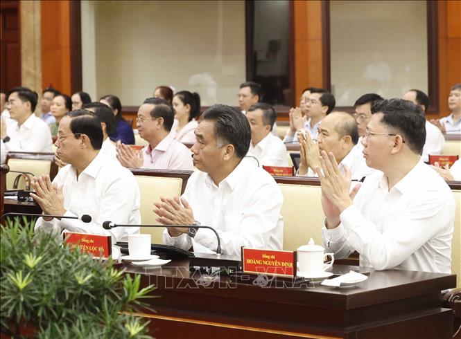 Các đại biểu tham dự buổi làm việc. Ảnh: Thống Nhất – TTXVN