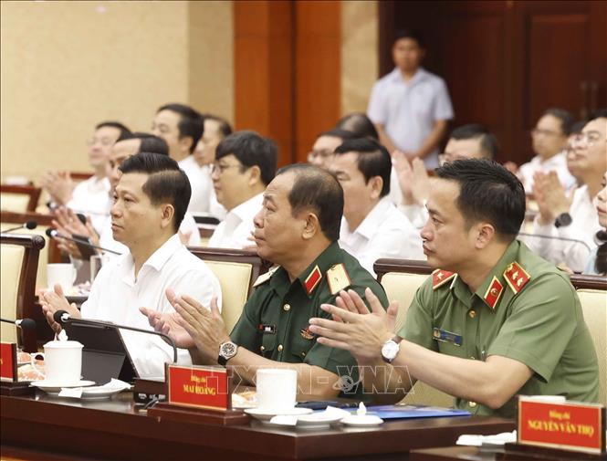 Delegates attend the working session. VNA Photo: Thống Nhất