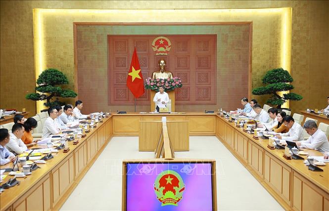 Thủ tướng Lê Minh Hưng làm việc với lãnh đạo Ngân hàng Nhà nước. Ảnh: Dương Giang – TTXVN