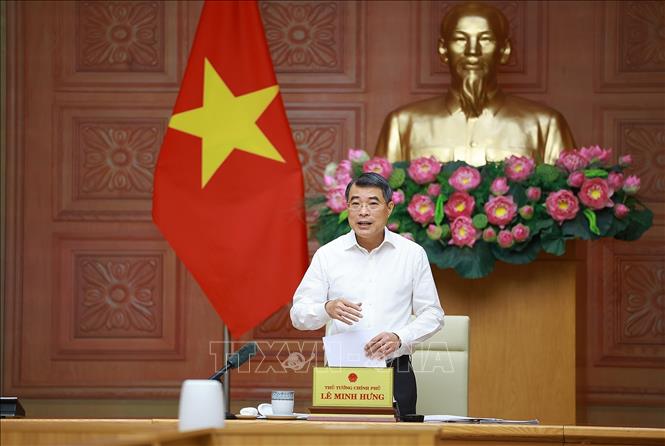 Thủ tướng Lê Minh Hưng làm việc với lãnh đạo Ngân hàng Nhà nước. Ảnh: Dương Giang – TTXVN
