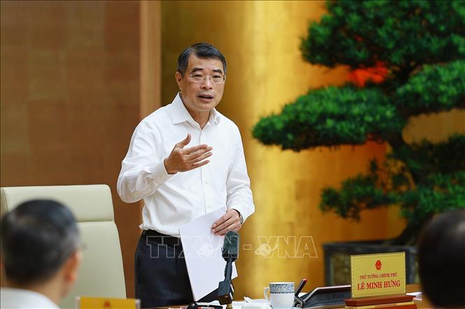 Thủ tướng Lê Minh Hưng làm việc với lãnh đạo Ngân hàng Nhà nước. Ảnh: Dương Giang – TTXVN
