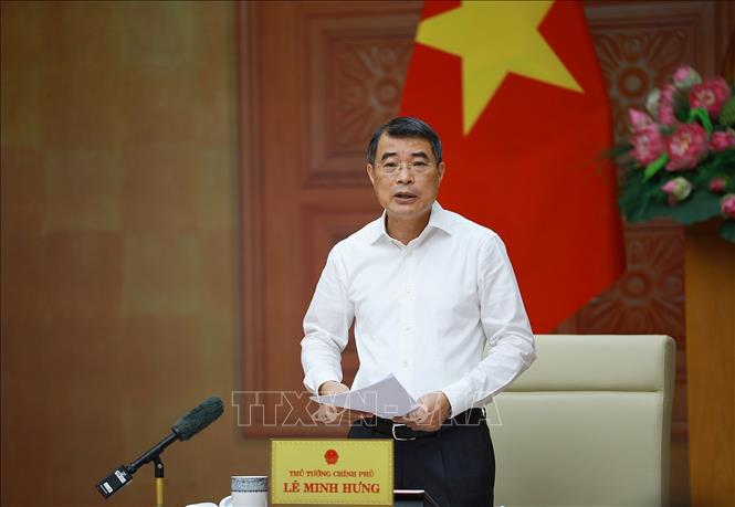 Thủ tướng Lê Minh Hưng làm việc với lãnh đạo Ngân hàng Nhà nước. Ảnh: Dương Giang – TTXVN
