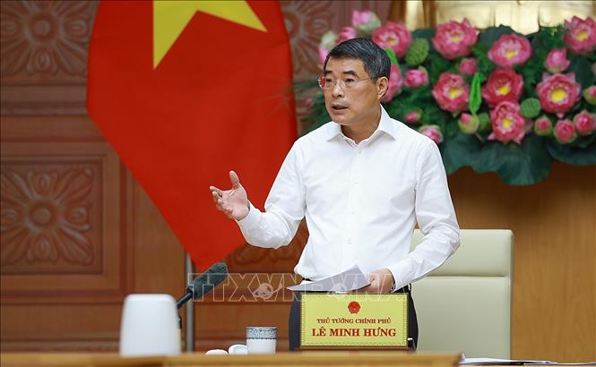 Thủ tướng Lê Minh Hưng làm việc với lãnh đạo Ngân hàng Nhà nước. Ảnh: Dương Giang – TTXVN