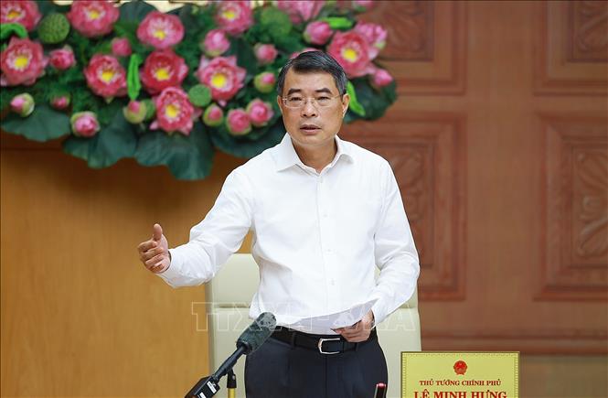 Thủ tướng Lê Minh Hưng làm việc với lãnh đạo Ngân hàng Nhà nước. Ảnh: Dương Giang – TTXVN