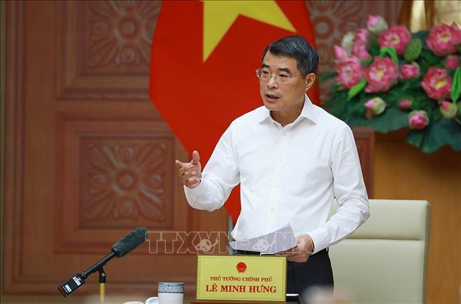 Thủ tướng Lê Minh Hưng làm việc với lãnh đạo Ngân hàng Nhà nước. Ảnh: Dương Giang – TTXVN
