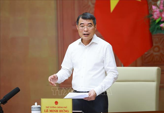 Thủ tướng Lê Minh Hưng làm việc với lãnh đạo Bộ Xây dựng. Ảnh: Dương Giang – TTXVN
