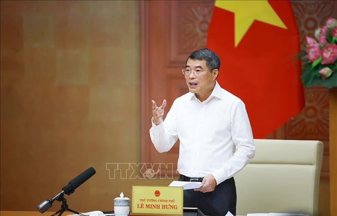 Thủ tướng Lê Minh Hưng làm việc với lãnh đạo Bộ Xây dựng. Ảnh: Dương Giang – TTXVN
