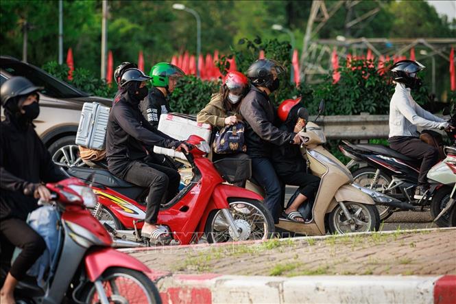 Nhiều gia đình rời Hà Nội từ sáng sớm để tránh ùn tắc, chuẩn bị cho kỳ nghỉ dài ngày.  Ảnh: Phạm Tuấn Anh - TTXVN