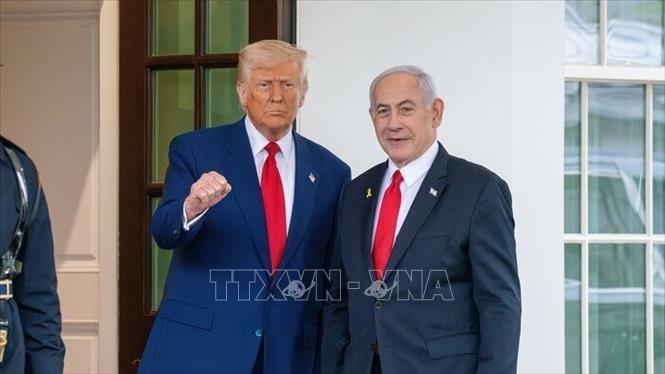 Tổng thống Mỹ Donald Trump (trái) trong cuộc gặp Thủ tướng Israel Benjamin Netanyahu tại Washington DC. Ảnh: IRNA/TTXVN