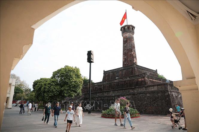 The Hanoi Flag Tower, a historical symbol of the capital, attracts large numbers of residents and tourists during the holiday. Photo: Pham Tuan Anh – VNA