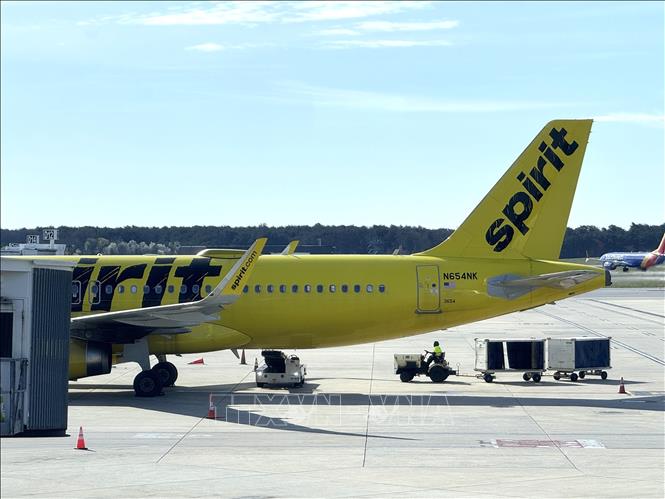 Một máy bay của hãng Spirit Airlines đang đón khách tại sân bay Baltimore, bang Maryland. Ảnh: Đoàn Hùng - P/v TTXVN tại Mỹ