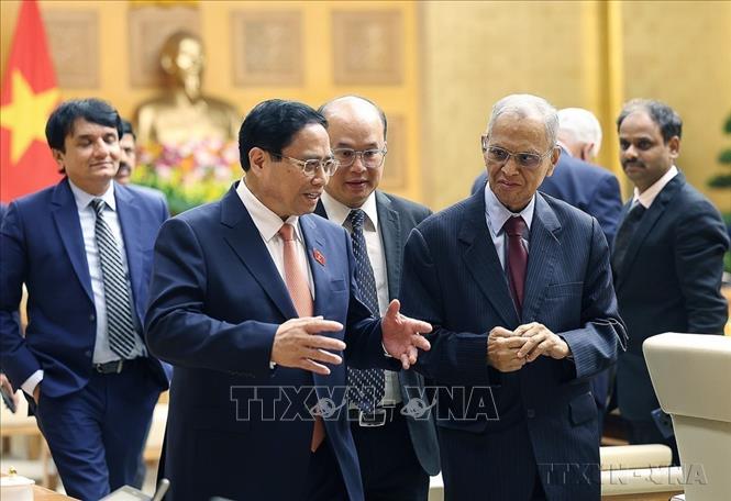 Thủ tướng Phạm Minh Chính tiếp ông Narayana Murthy, nguyên Chủ tịch, người sáng lập Tập đoàn Infosys - Tập đoàn công nghệ thông tin hàng đầu của Ấn Độ (Hà Nội, 20/5/2024). Ảnh: Dương Giang-TTXVN
