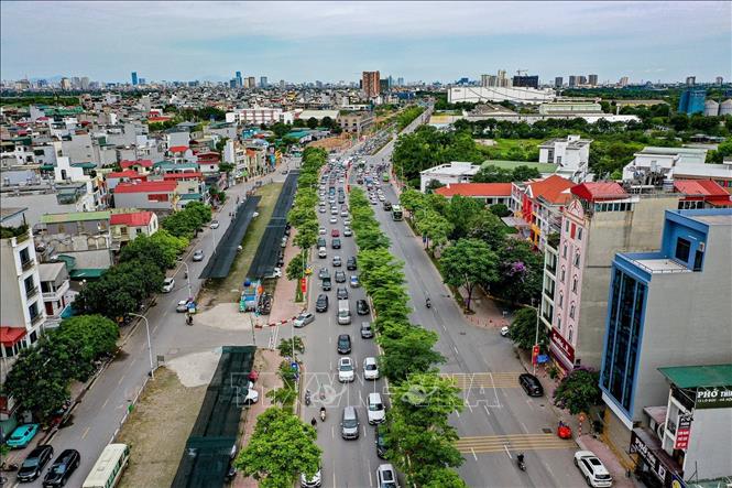 Trục Cổ Linh – Thạch Bàn (hướng từ cuối cao tốc Hà Nội – Hải Phòng về Long Biên), phương tiện lưu thông ổn định, không xảy ra ùn tắc. Ảnh: Trung Nguyên - TTXVN