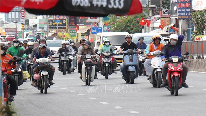 Quốc lộ 13 khá thông thoáng  trong buổi trưa ngày cuối của kỳ nghỉ lễ 30/4. Ảnh: Thanh Vũ-TTXVN
