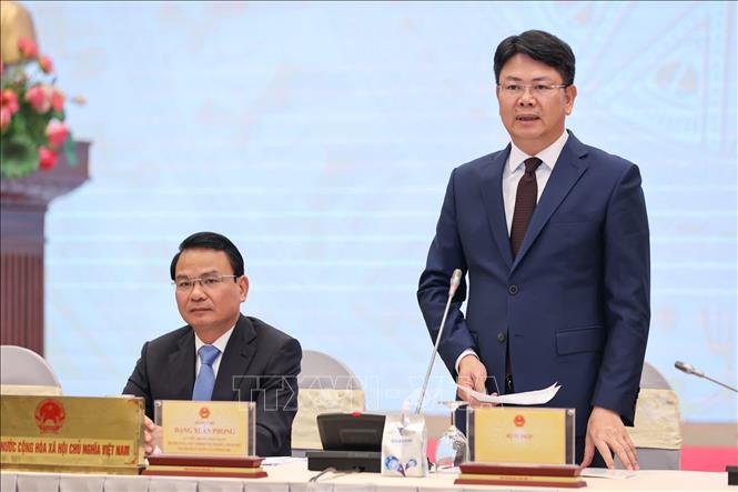 Thứ trưởng Bộ Tư pháp Nguyễn Thanh Tịnh trả lời câu hỏi của các phóng viên tại buổi họp báo. Ảnh: TTXVN